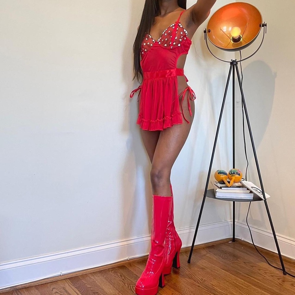 Sexy bright red mesh teddy apron by Fredericks of Hollywood.